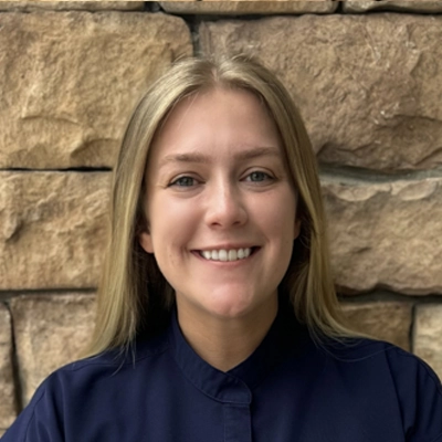 A headshot of Ally, a employee at The Optimal Health Chiropractic.