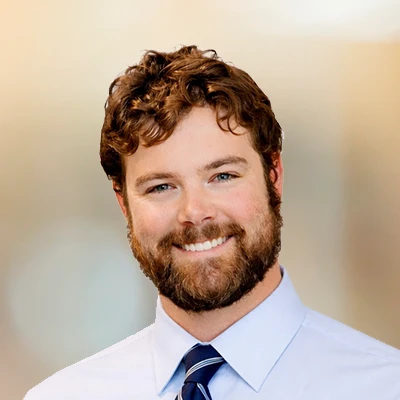 A headshot of Dr. Ike Anderson, a chiropractor at The Optimal Health Chiropractic.